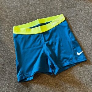 Nike Pro Blue Shorts with Neon Yellow Waistband